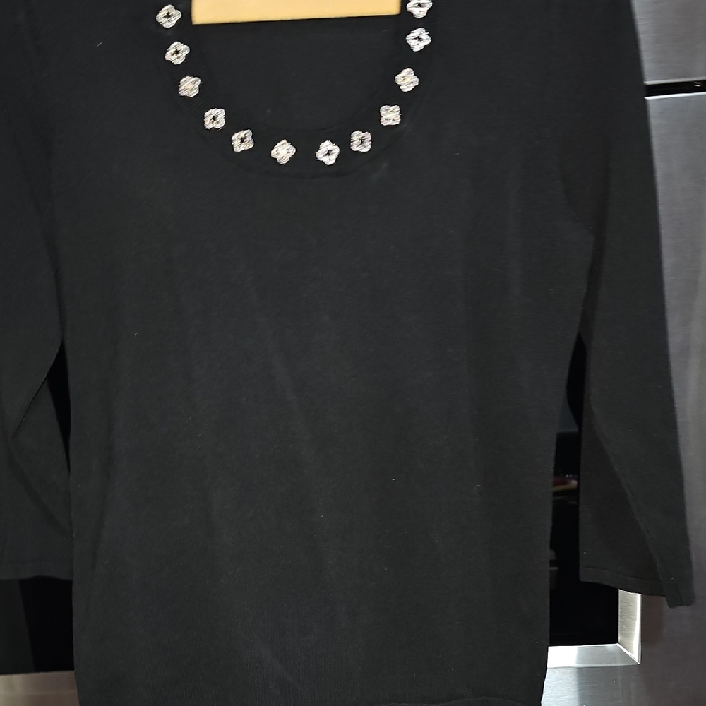 Chic Black Women's Sweater with Embellished Neckline